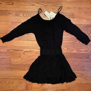 NWT Boutique Brand Elan black dress. Women’s size small.